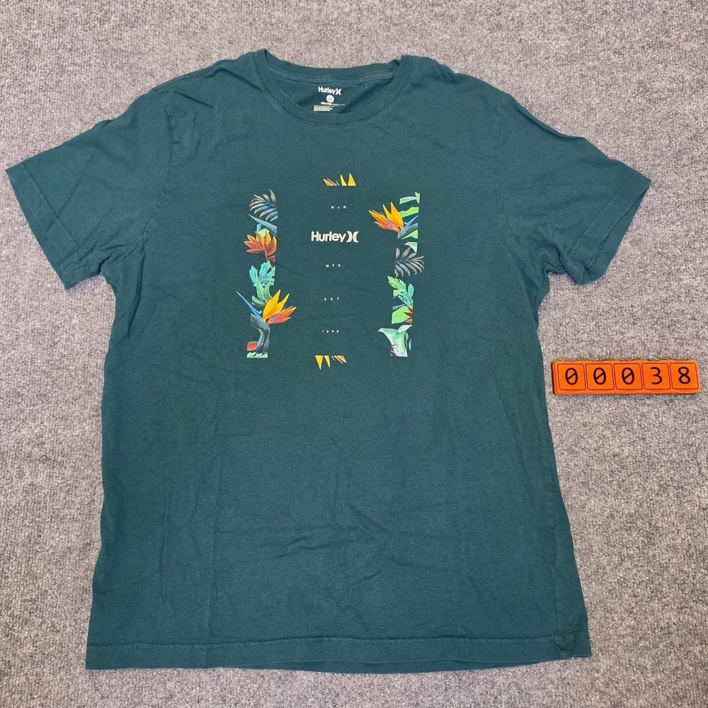 Hurley T-Shirt with tropical floral and leaf design. Size large.